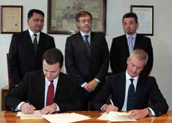 Signing the Memorandum with Orlandi in Brescia